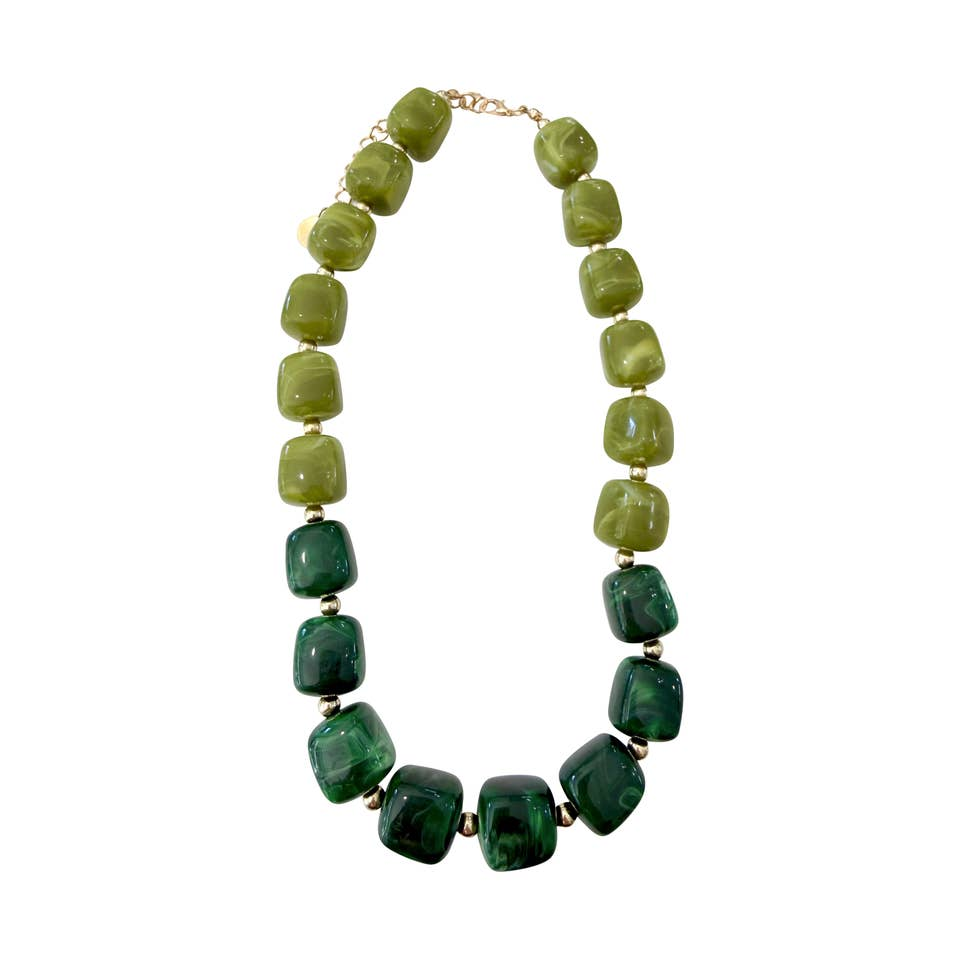 Charlotte Chunky Beaded Necklace featuring oversized green marbled beads and gold accents.