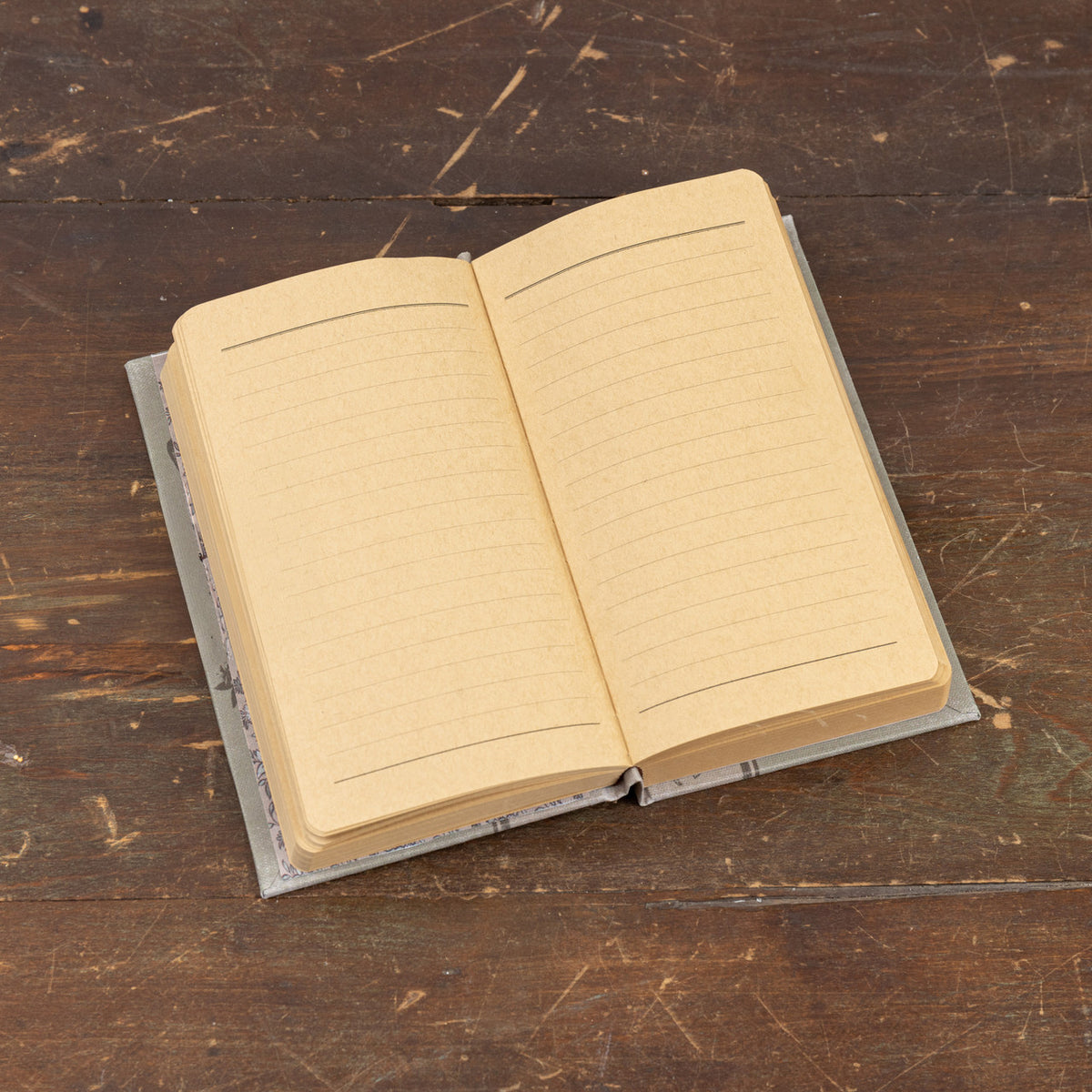 7-inch Wildlife in the Meadows journal with a wood cover featuring meadow scenery.