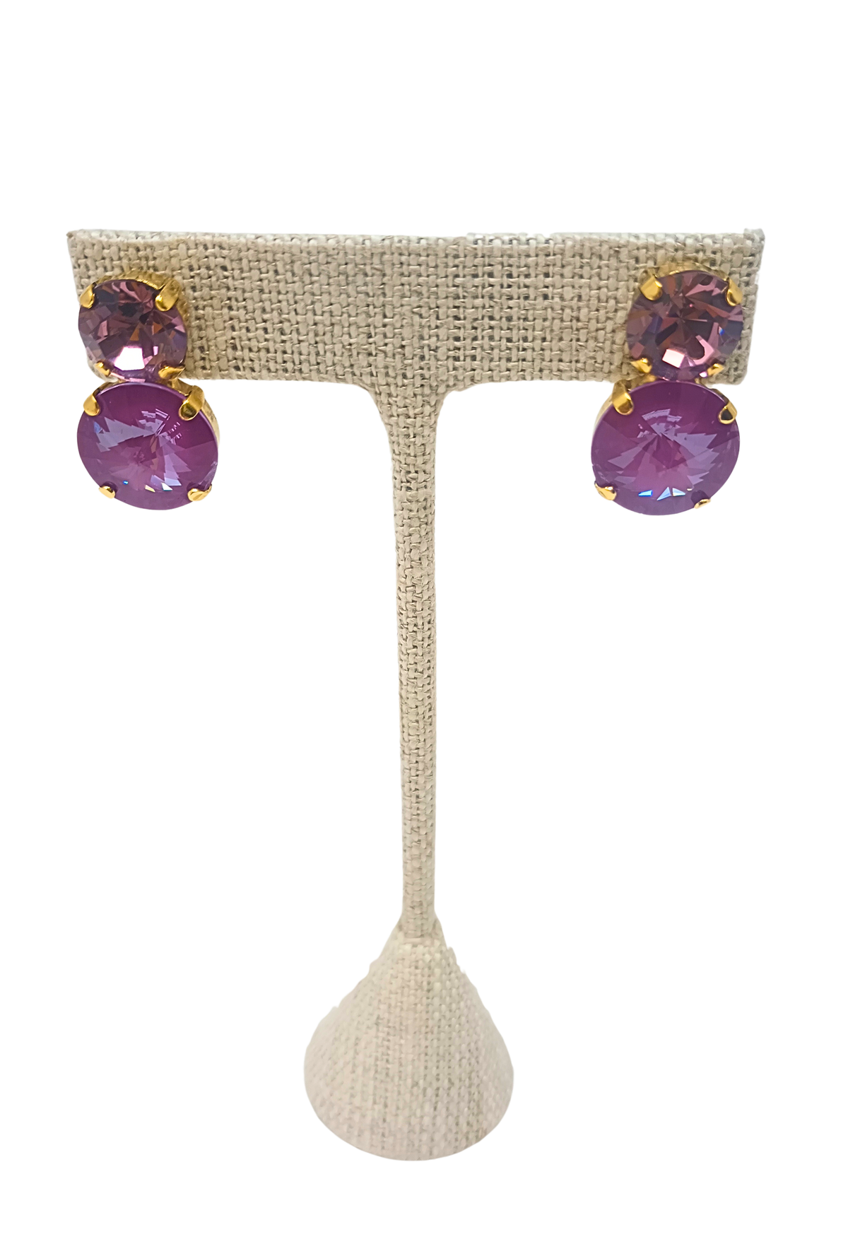 Maegan Earrings featuring two-tiered round purple crystals in a gold-tone brass setting.