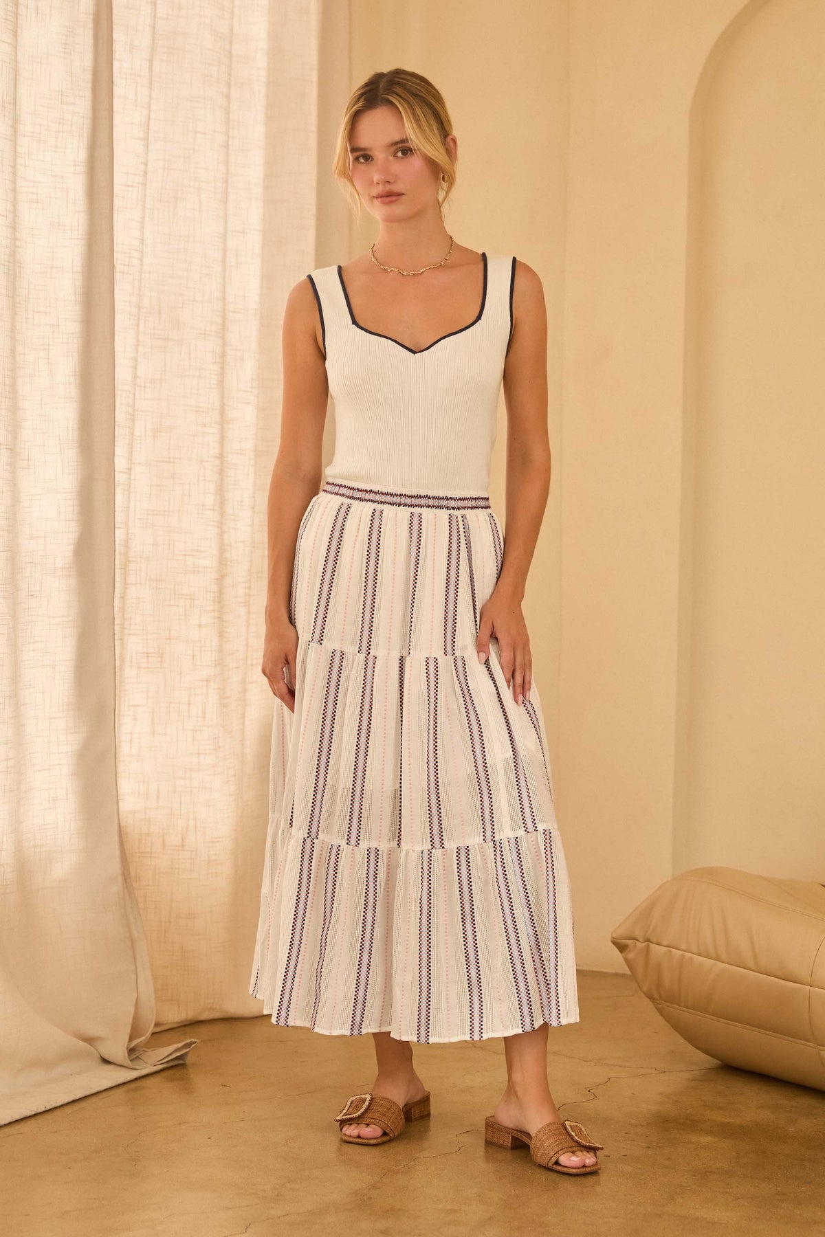 Chloe Stripe Tiered Midi Skirt in black and white stripes with a flowing silhouette
