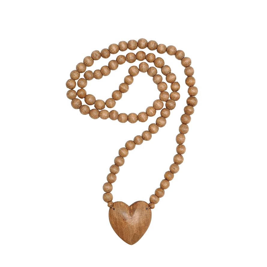 36-inch hand-carved wooden rosary featuring a heart-shaped centerpiece with natural wood grain texture.