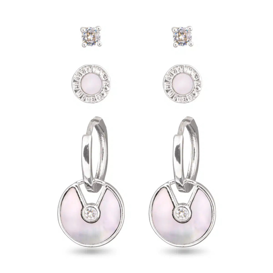 Silver trio earring set featuring CZ studs, round mother of pearl studs, and mother of pearl hoops.