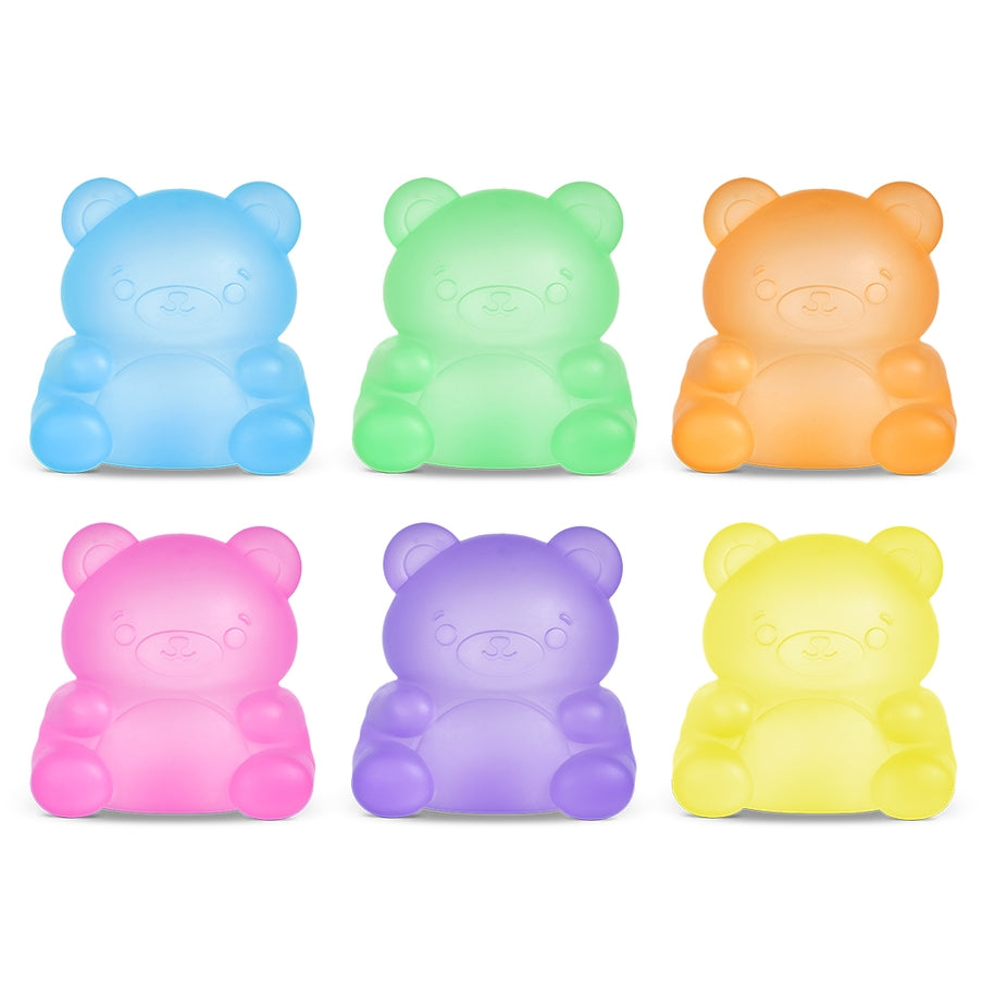 Six colorful, translucent gummy bear-shaped squishy toys in blue, green, orange, pink, purple, yellow