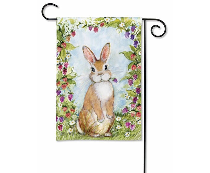 Garden flag featuring a watercolor painting of a rabbit sitting among berries and flowers.
