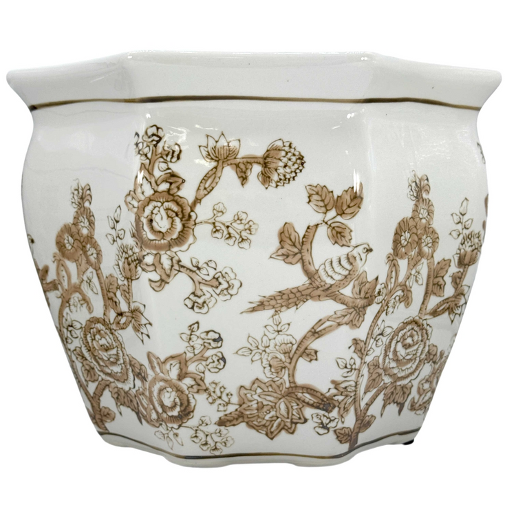 Octagonal white ceramic planter with brown chinoiserie floral and bird pattern.