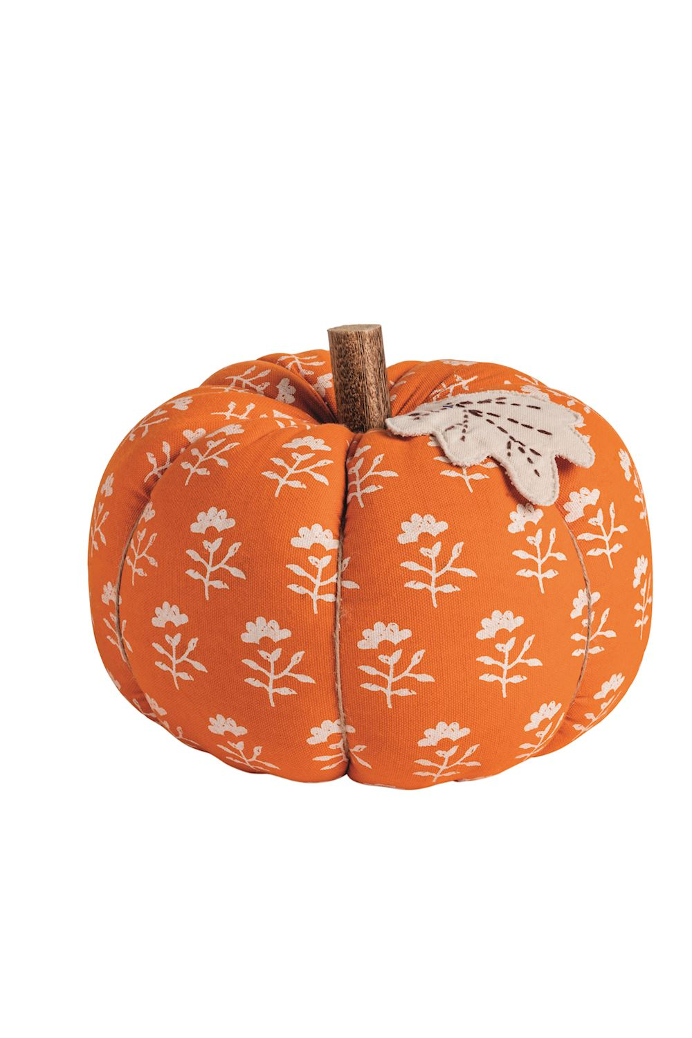 Orange stuffed pumpkin with white floral print, mango wood stem, and embroidered canvas leaf.