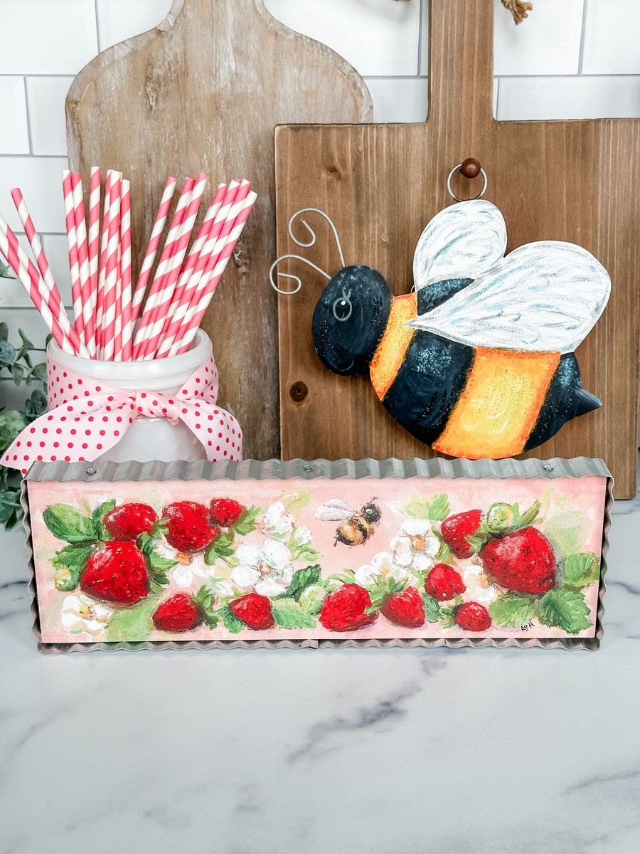 Mini Classic Bee Charm pendant featuring a gold-tone metal bee silhouette on a black enamel background.