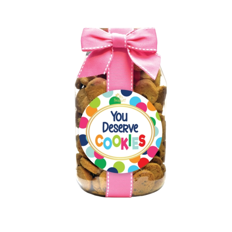 Quart jar of chocolate chip cookies with a pink ribbon and a 'You Deserve Cookies' polka dot label.