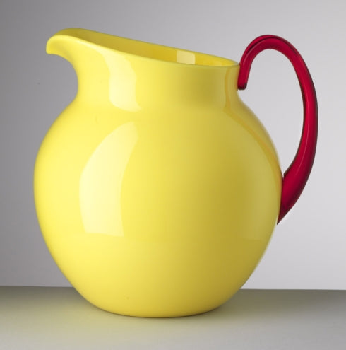 Pallina Pitcher in white ceramic with a rounded handle.