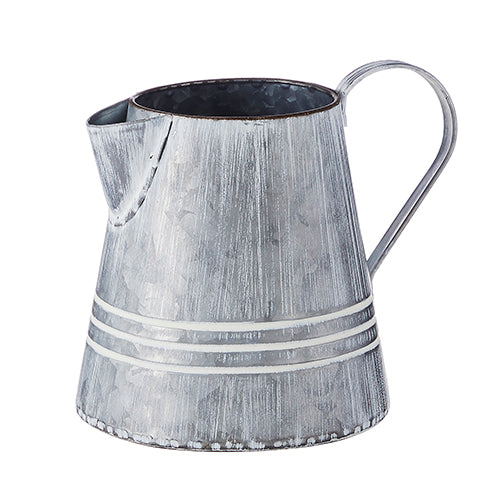 Metal pitcher with open lid in whitewashed finish