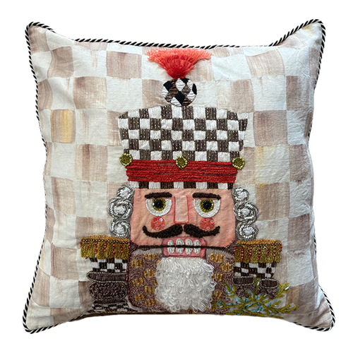 Mocha Check Nutcracker Throw Pillow with beaded and embroidered details on a checkered background.