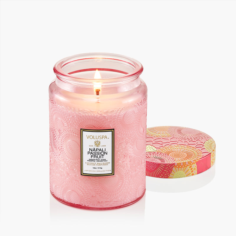 Large glass jar containing Napali Passion Fruit candle with citrus fruity notes.