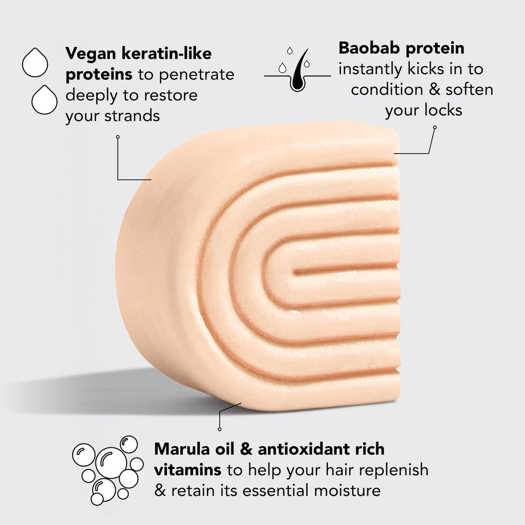 Strengthening Bond Repair Solid Hair Mask bar with Marula oil, Baobab protein, and vegan keratin.