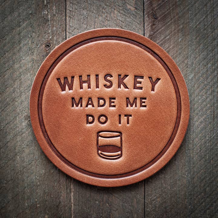 Square leather coaster with a natural patina finish.