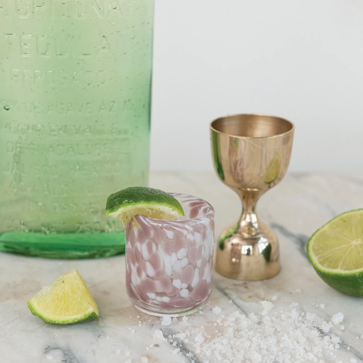 Brass double-sided cocktail jigger with 1 oz/2 oz measurements