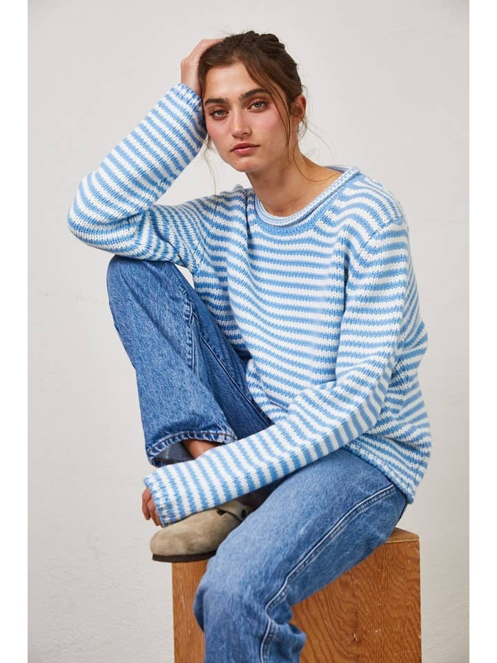 Oversized Selene stripe knit sweater in soft gray with dropped shoulders, ribbed cuffs, and side slits.