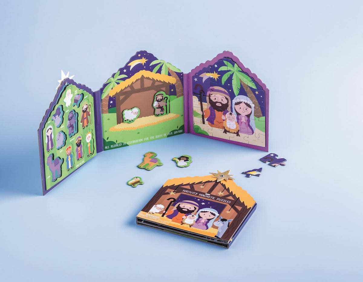 Magnetic nativity puzzle with colorful figures on a white background.