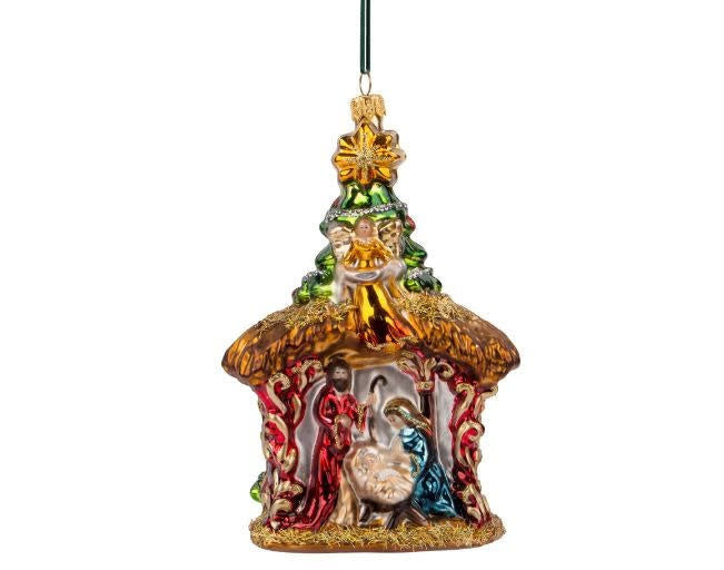 Hand-blown glass Nativity ornament with hand-painted figures in a traditional silhouette.