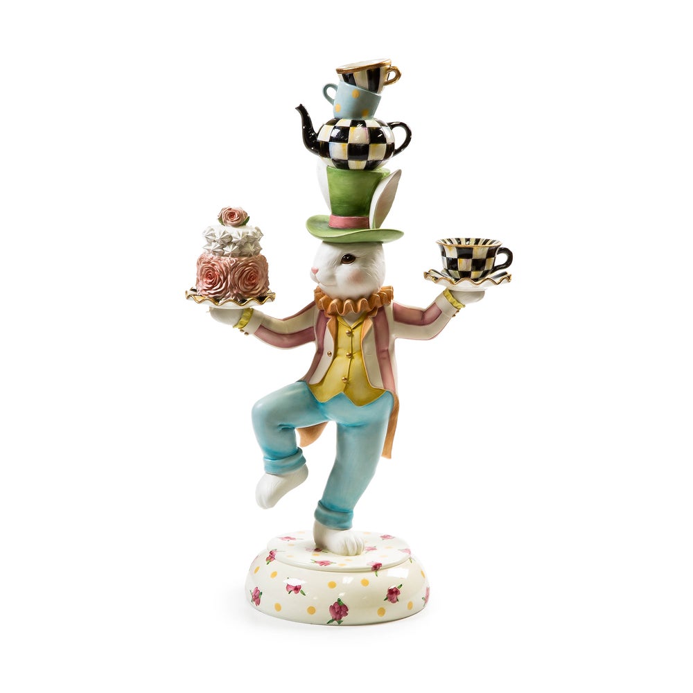 Rose Rabbit Centerpiece featuring a white rabbit balancing a cake, teacup, and stacked teapot.