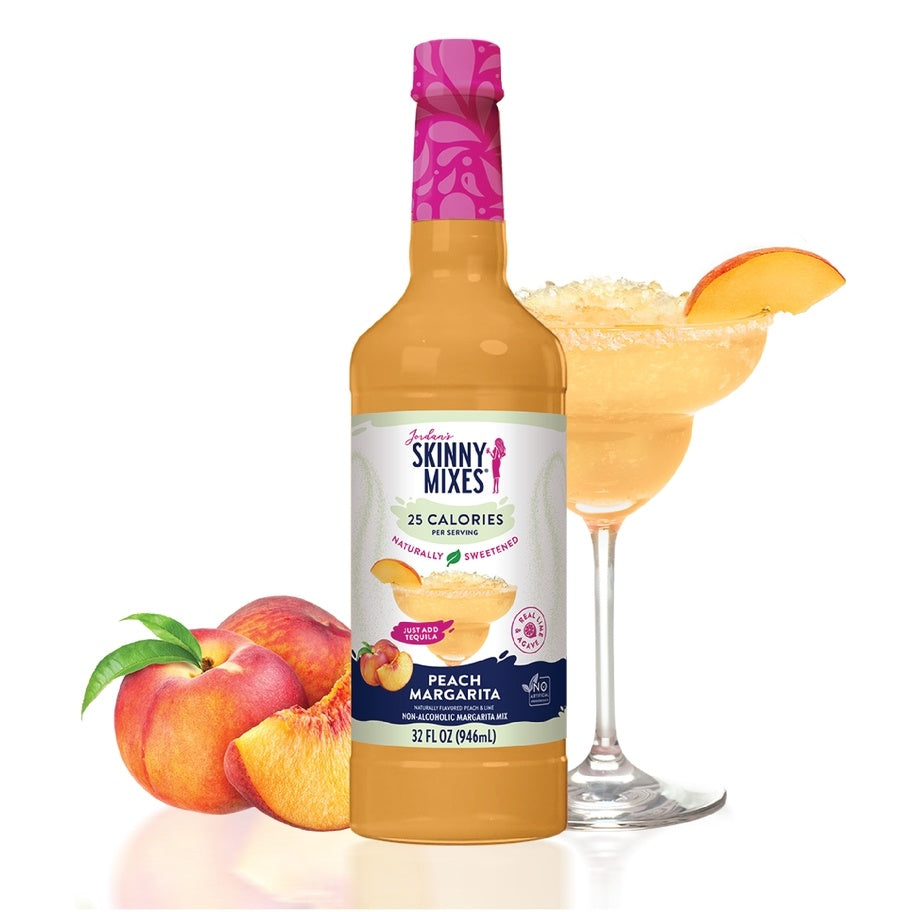 Natural Mixer peach margarita blend in a clear glass jar with orange liquid.