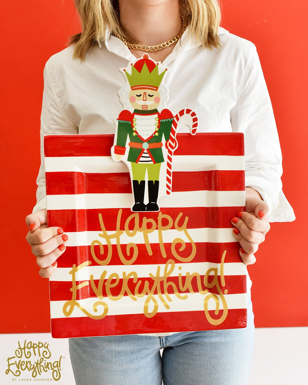 Ceramic square platter in red with white text reading Red Stripe Big Happy Everything!
