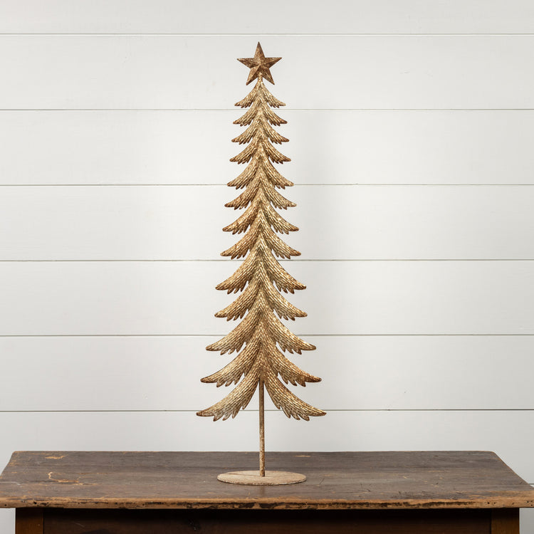 Gold metal tree decoration with a star topper