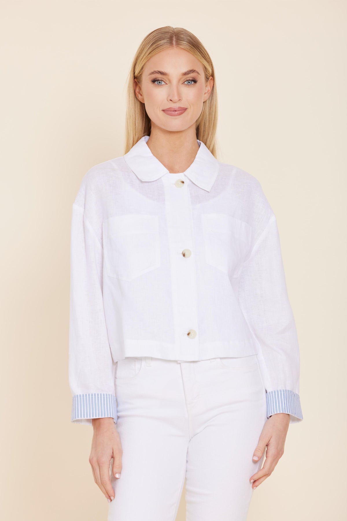 Relaxed fit Grace linen jacket in natural tone with button-up front and pin stripe cuffs.