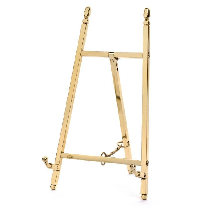 Gold easel desk calendar with Karen Adams artwork on natural white paper.