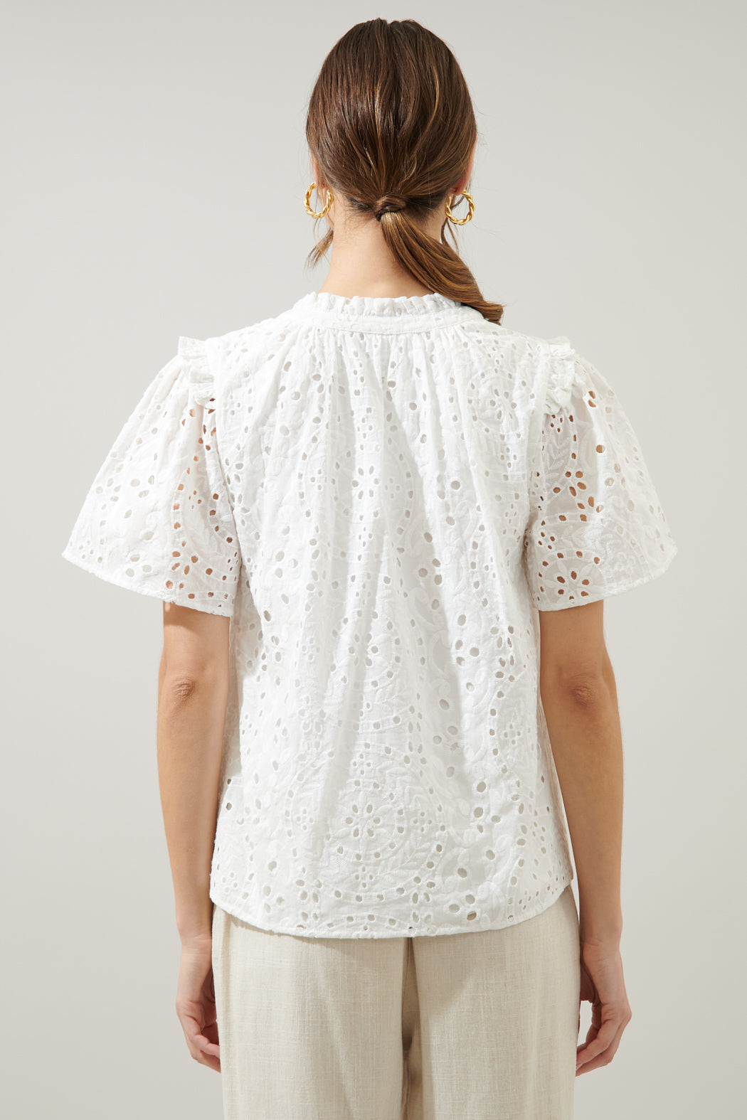 Faye Rain or Shine Eyelet Top in white cotton with a split neckline.