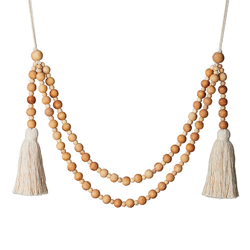 20-inch double swag wood beaded garland with cotton tassels on each end.