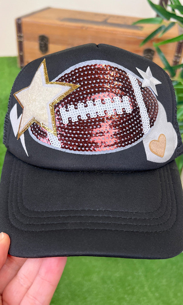 Black trucker hat with embroidered football patch on front panel