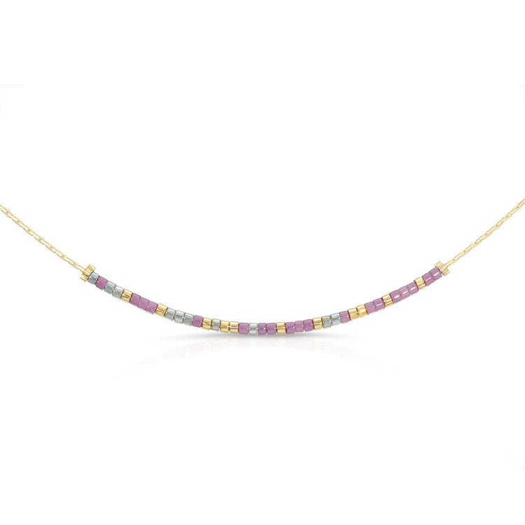 Gold chain necklace with shimmery gray and plum glass beads spelling 'Love You Mom' in Morse code.