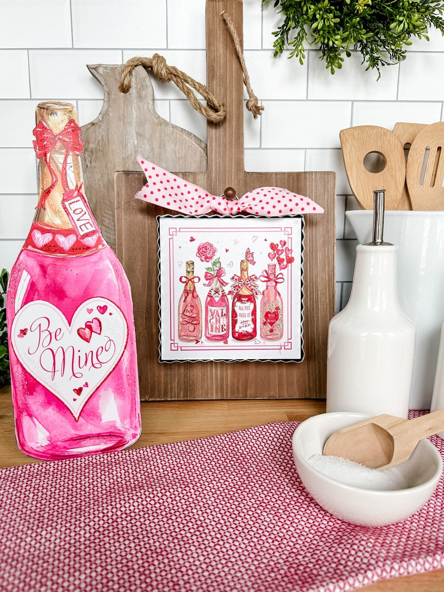 Mini Beck's Love Ina Bottle in white ceramic with a hanging loop.