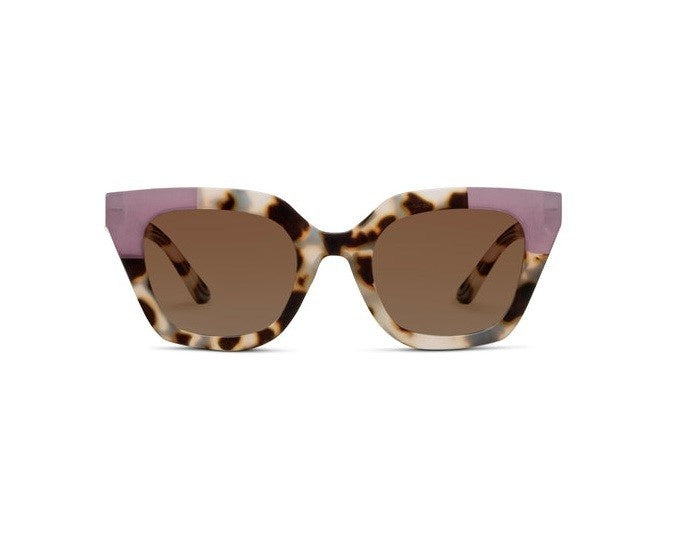 Nell reading sunglasses in chai tortoise rose polycarbonate frames with polarized lenses and spring hinges.