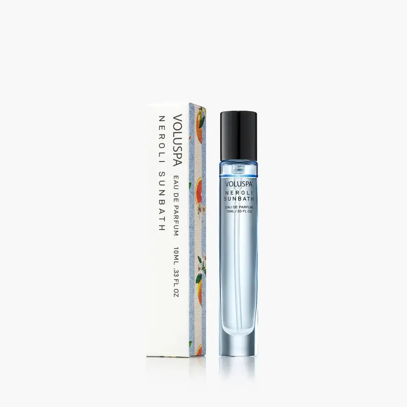 Neroli Sunbath Eau De Parfum bottle with clear glass, white cap, and minimalist label design.