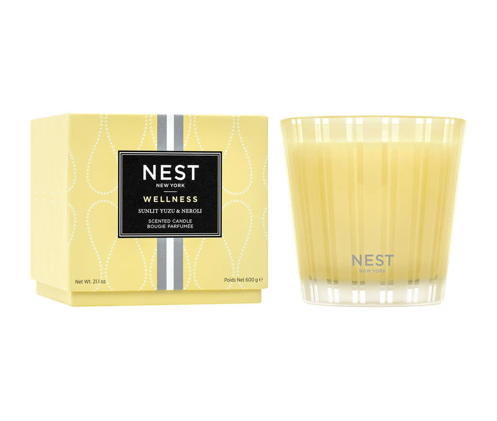 Sunlit Yuzu Neroli Nest three-wick candle in a clear glass jar with white wax.