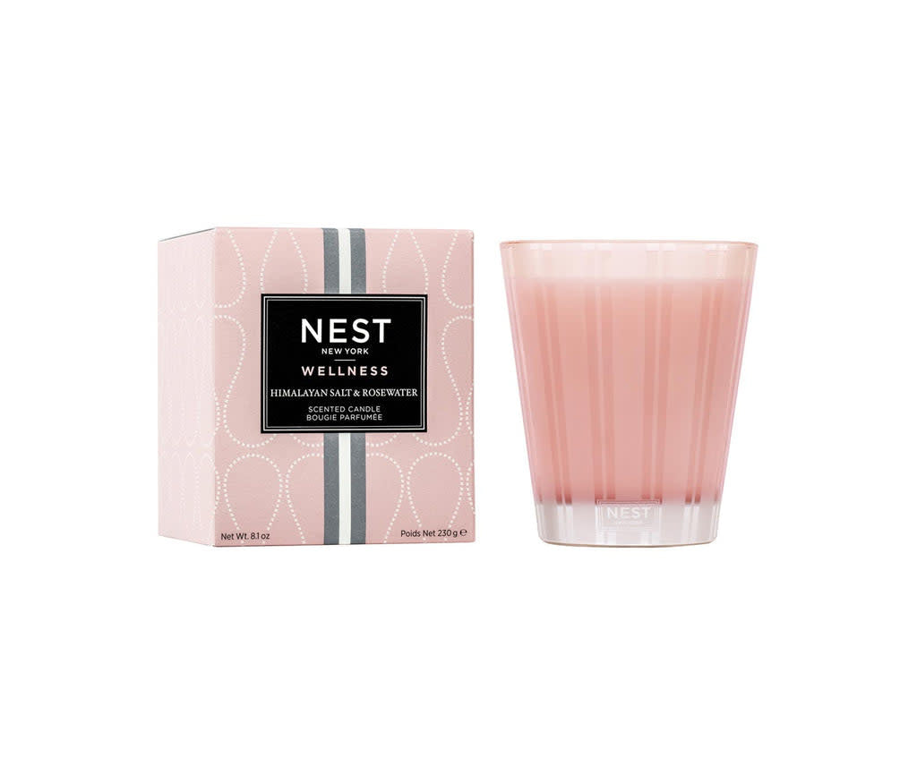 Nest Classic Candle in Himalayan Salt Rosewater scent with a smooth cylindrical glass jar and white wax.