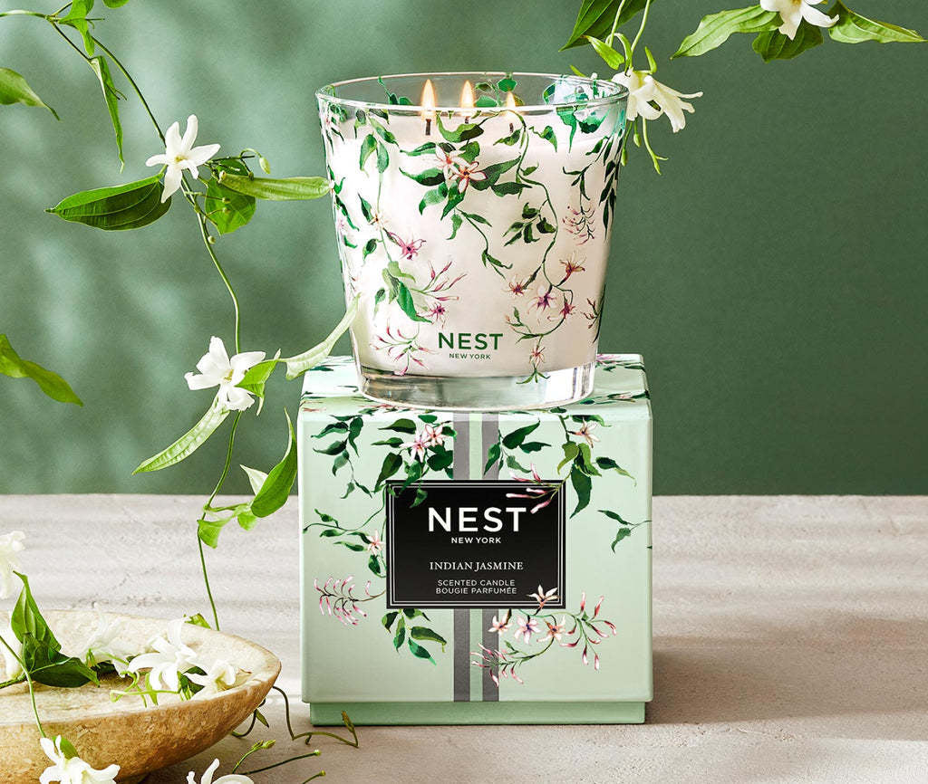 Nest Specialty three-wick candle in reusable glass with watercolor raindrop pattern
