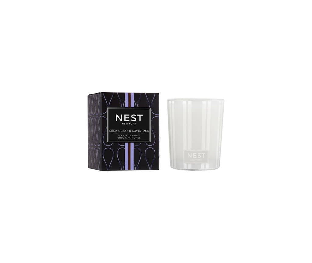 Nest Votive Candle in Cedar Leaf Lavender scent with a smooth white wax and glass container.