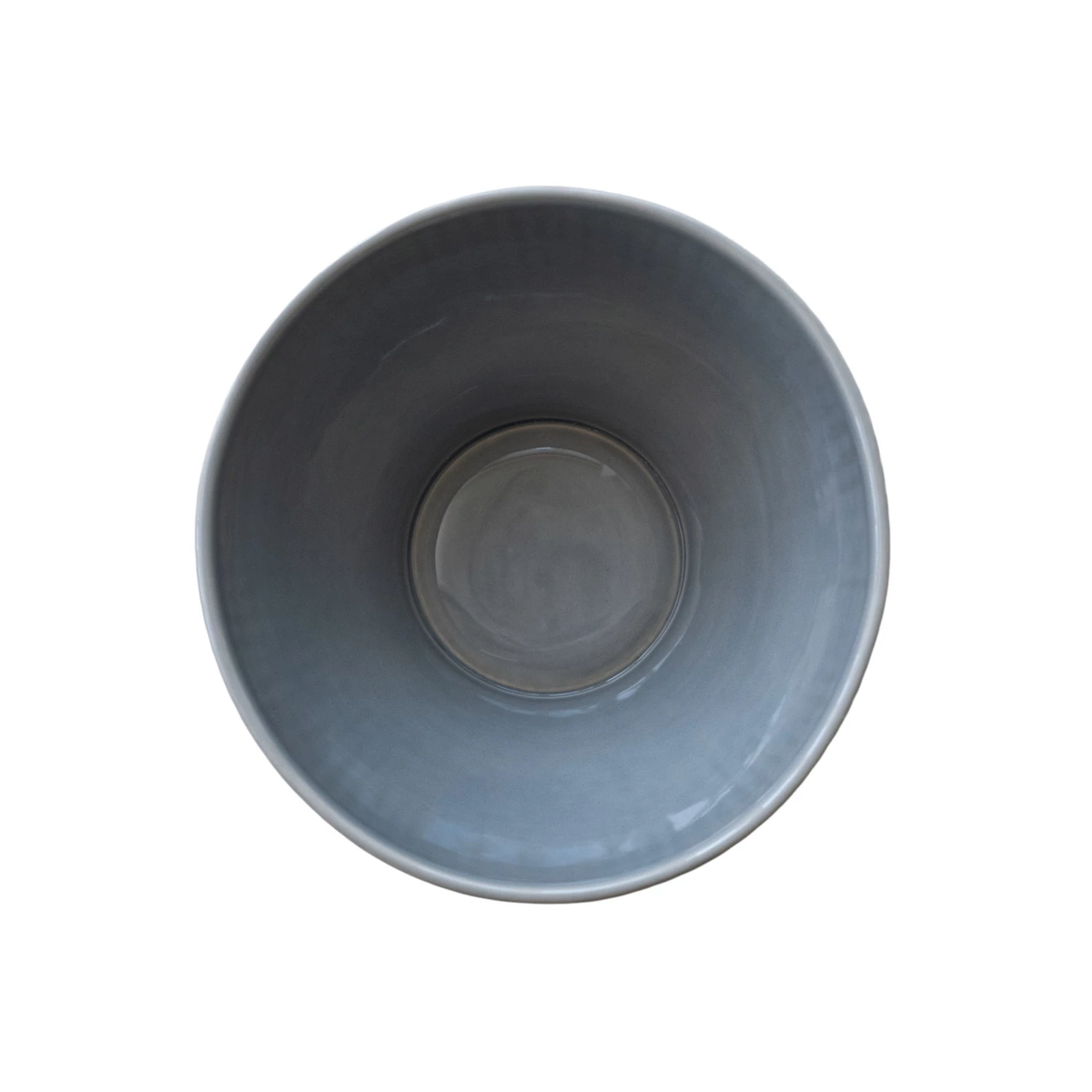 Reactive glaze stoneware fluted serving bowl with a round silhouette.