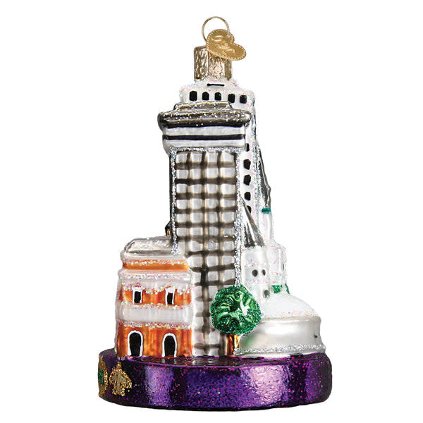 Mouth-blown glass New Orleans ornament with hand-painted silver accents and glitter finish.
