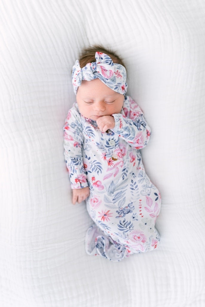 Newborn knotted baby gown set in soft modal fabric with built-in mittens and henley neck.