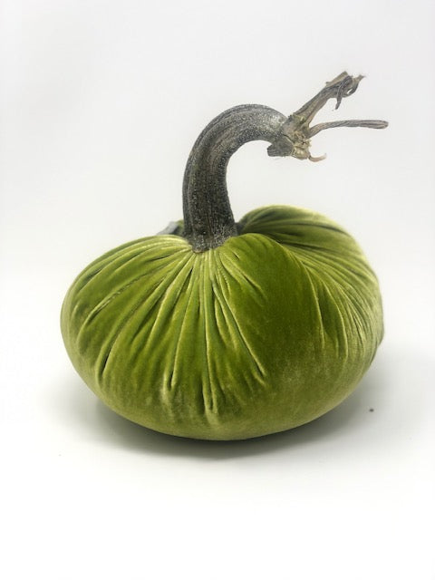 Handmade orange velvet pumpkin with a natural stem.