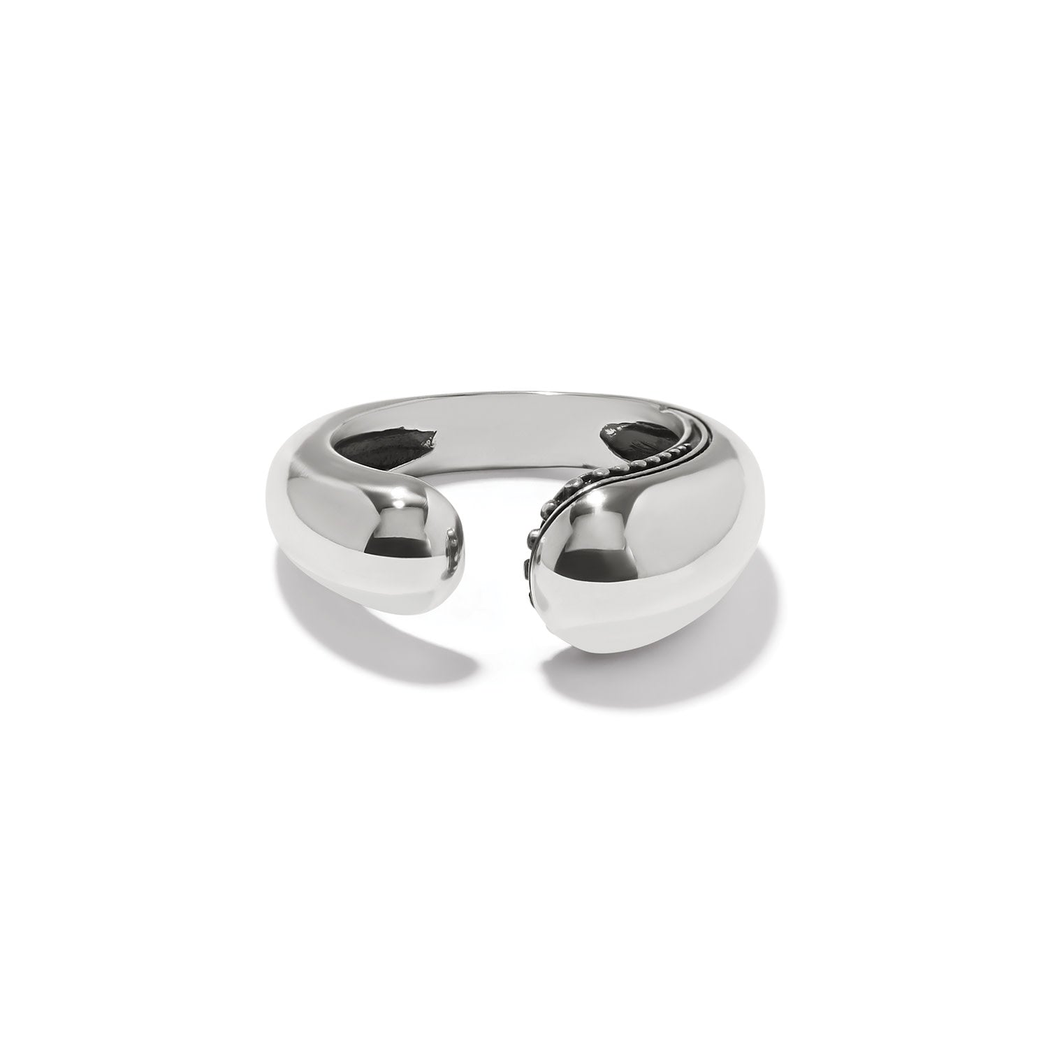 Silver plated droplet ring with organic curved silhouette featuring tiny beading on one side and smooth finish.