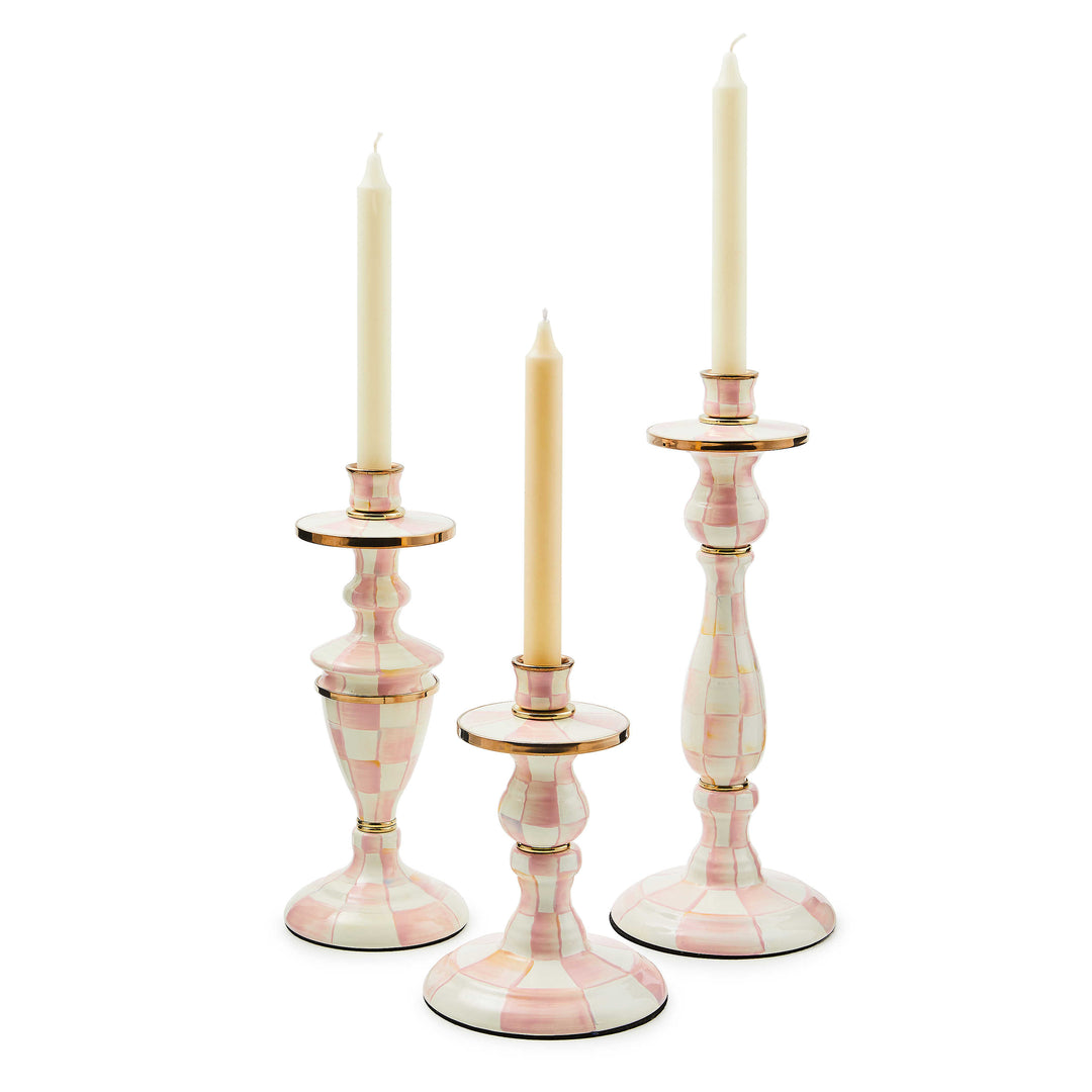 Three Rosy Check candlesticks in varying heights with hand-painted pink and white checks.