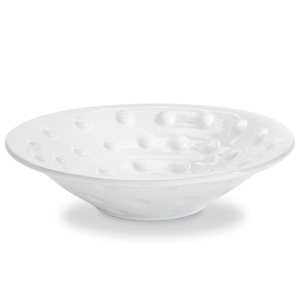 Raised dotted centerpiece bowl with a textured surface.