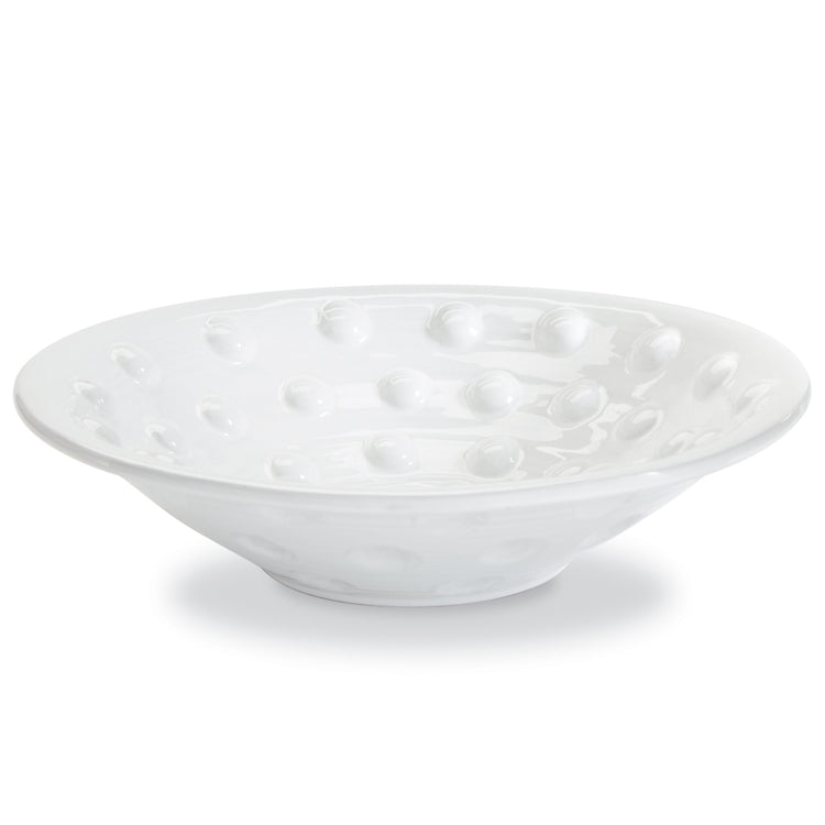 Raised dotted centerpiece bowl with a textured surface.