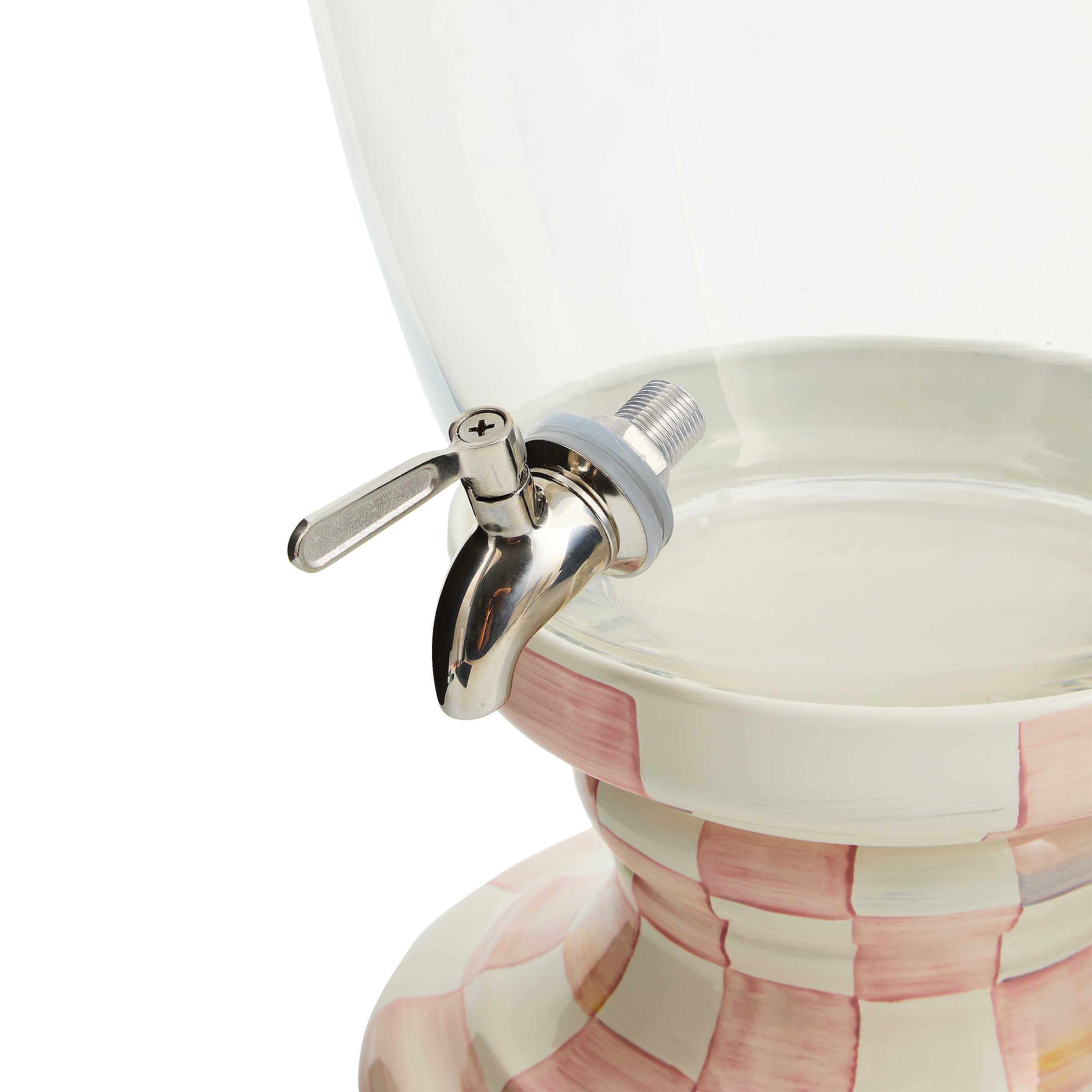 Close-up of the silver spigot on a Rosy Check Beverage Hostess with a hand-painted pink base.