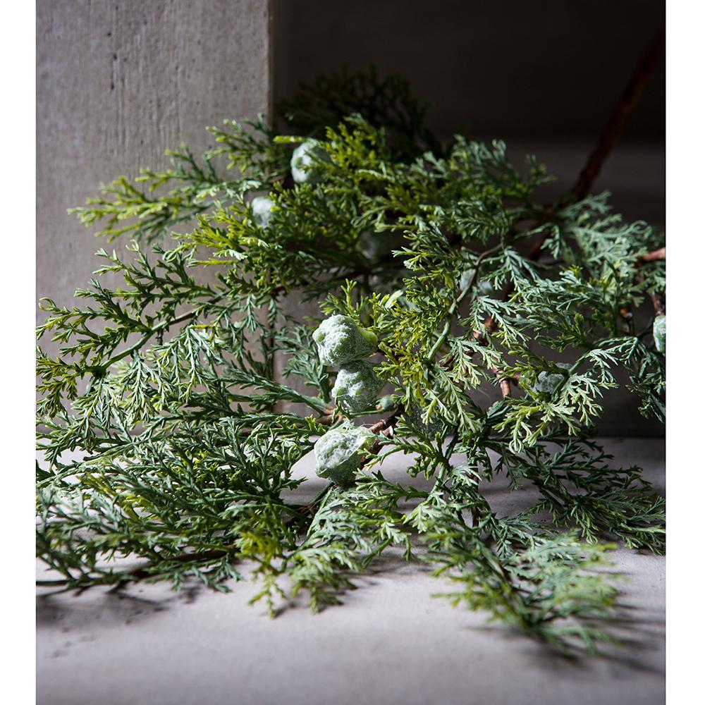 18-inch juniper spray with green berries and lush evergreen foliage on a neutral surface.