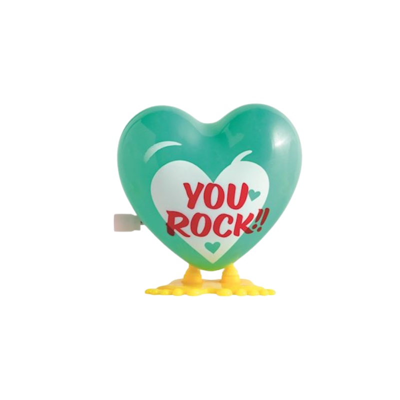 Teal wind-up hopping heart toy with yellow feet and red 'YOU ROCK!!' text on a white heart center.